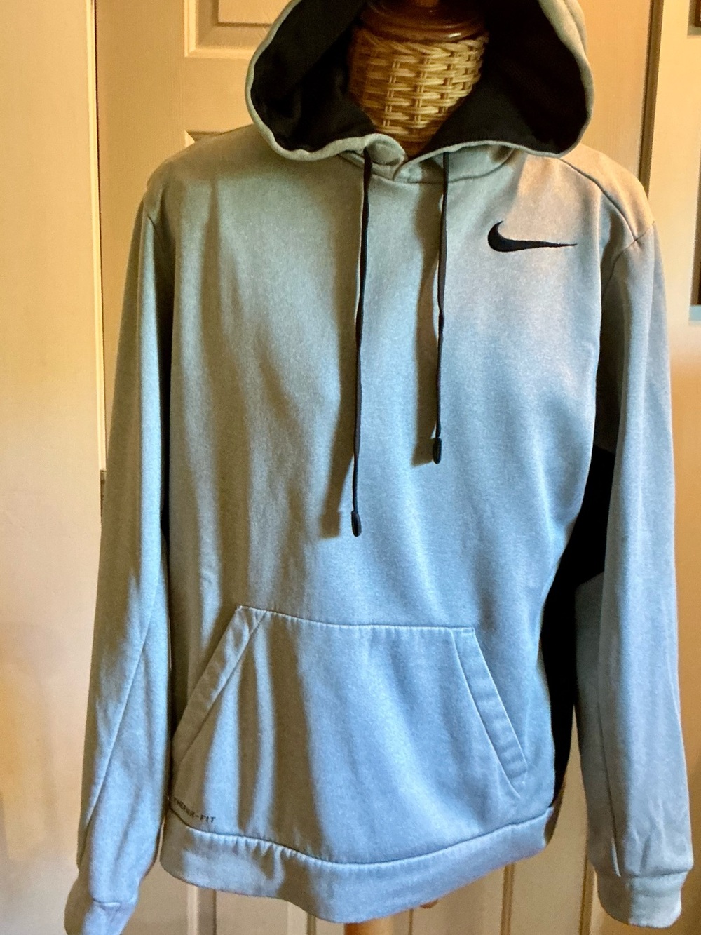 Nike women’s Light Heather Gray Pullover Hoodie with Black Swoosh